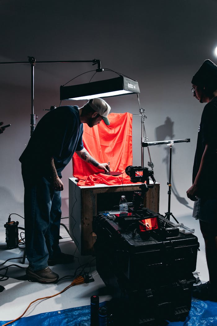 services-02 Professional film setup with crew, lighting, and camera equipment in Orlando studio.